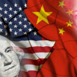 China War Games Target America’s Eyes in Space USA and China flags with currency images overlayed