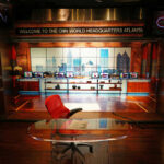 News studio with chair desk and city backdrop