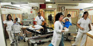 Busy hospital scene with medical staff and patients
