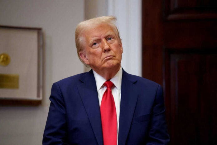 2591582183 Man in suit with red tie looking contemplative