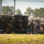 Cartels SEIZE Mexican Roads — Drivers TRAPPED Overturned truck with people standing nearby outdoors
