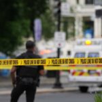 Intelligence FAILURE Enables Mass Beach Slaughter Police officers near a crime scene marked by caution tape