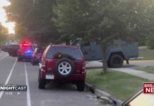 3 found dead in St. Paul shooting, person of interest taken into custody